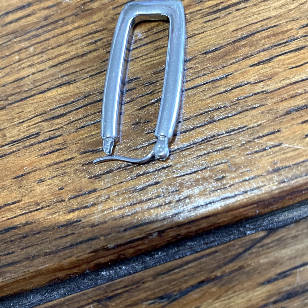 Silver 1.5 in rectangle pierced earrings. Very secure and light. They are pretty - Picture 7 of 12